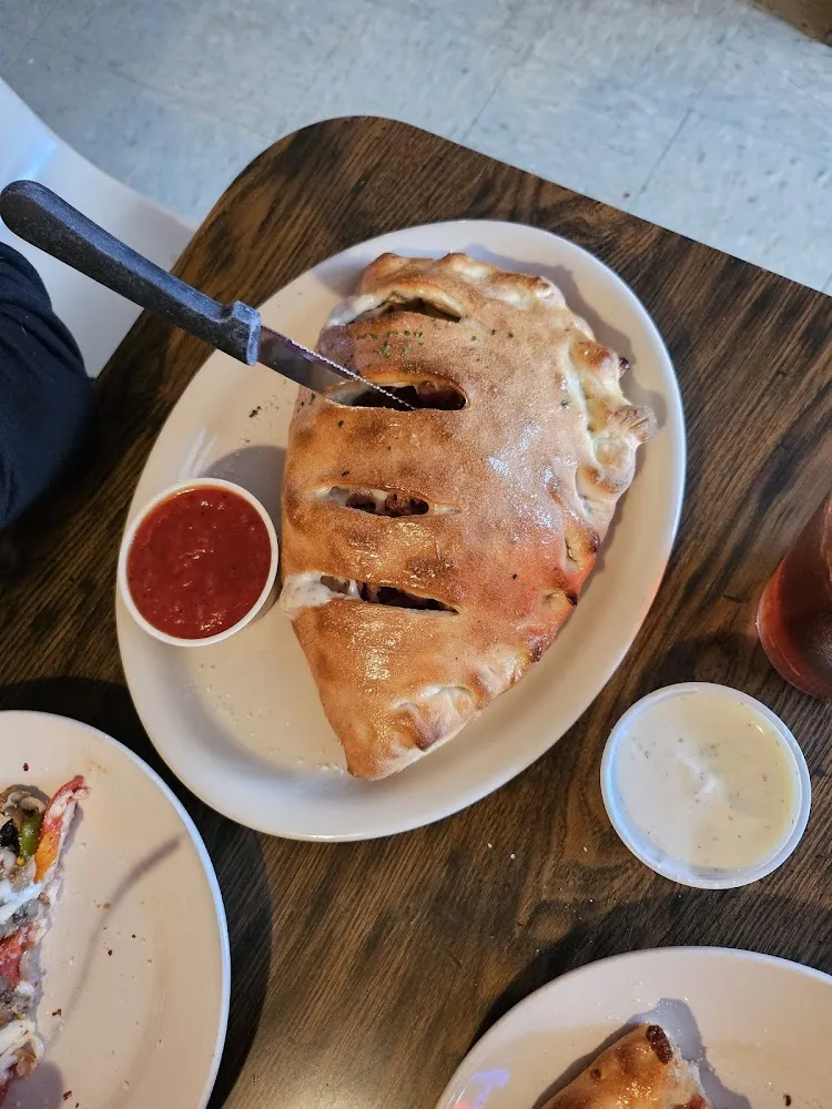Personal Pizza Rolled Up and Brickoven Baked